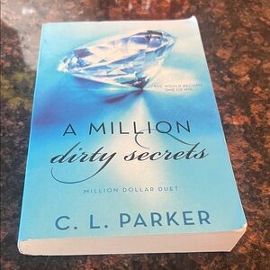 A Million Dirty Secrets Book by C.L. Parker